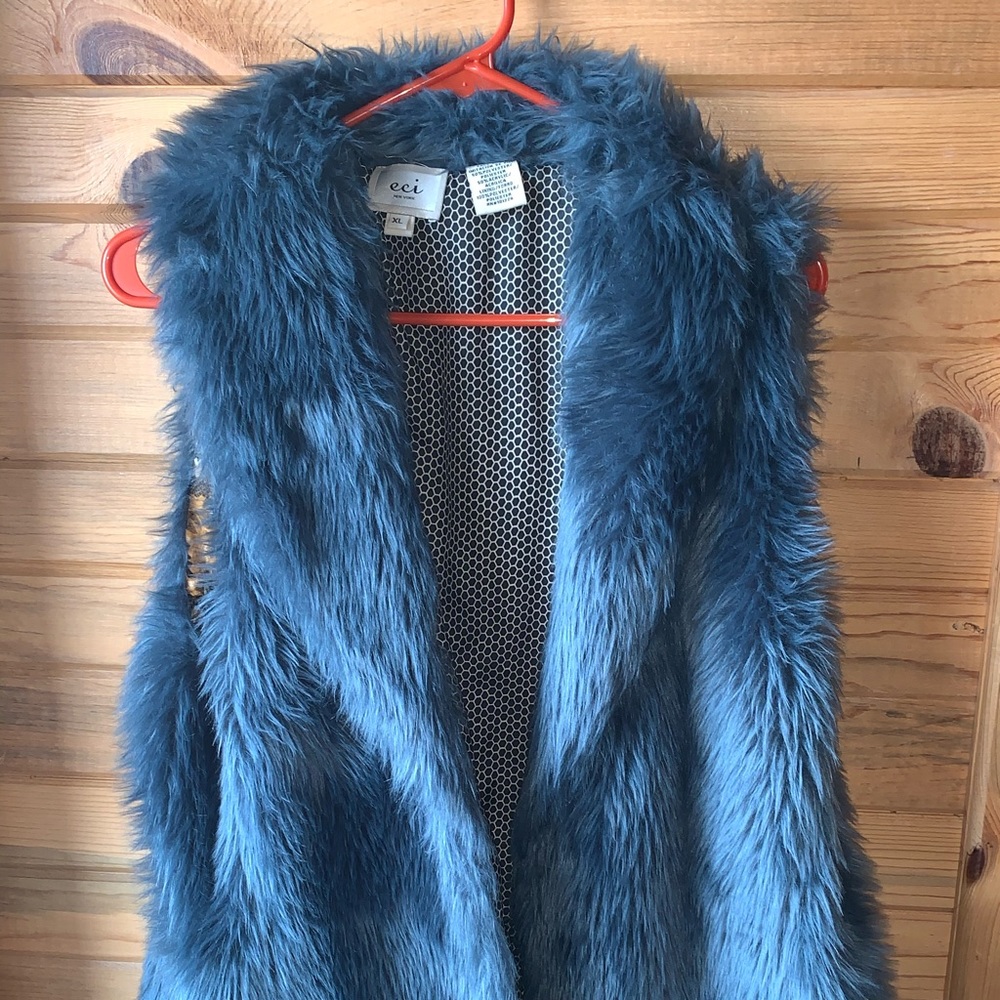 Blue furry vest